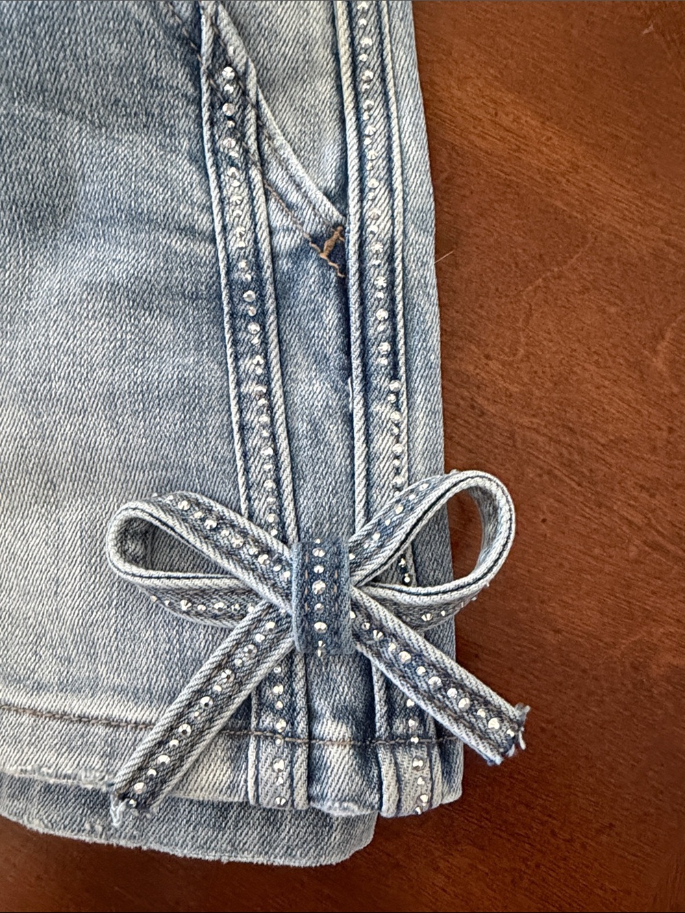 KanCan Light Blue Denim Shorts with Side Bow Details - Picture 6 of 7